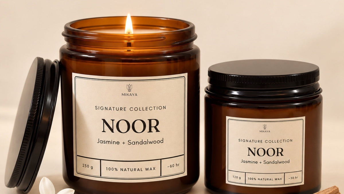 Noor jasmine and sandalwood scented jar candles, 250 g lit and 120 g, with jasmine flowers and sandalwood