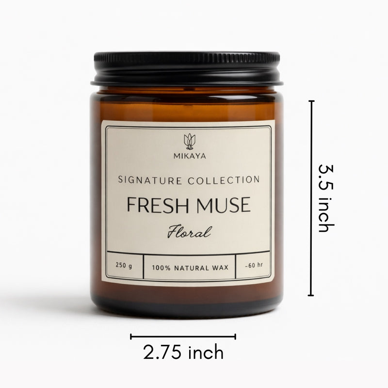 Meadow fresh floral scented jar candle in amber glass